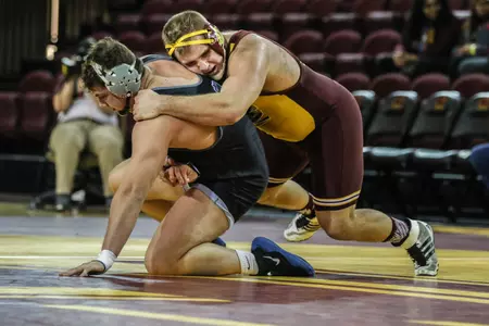 Newton Smerchek (right) took a 4-3 win in overtime Friday to help propel the Central Michigan wrestling team to its fifth consecutive dual-meet victory.