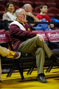 Longtime CMU athletic trainer John Mason, a 1978 CMU grad, awaits the tipoff of a recent game at McGuirk Arena. Mason will retire in May after 36 years at CMU.