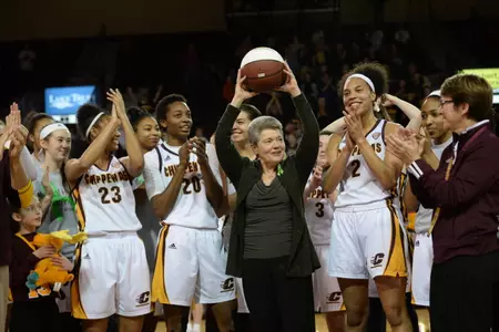 CMU coach Sue Guevara displays the ball she was presented after Saturday's win at McGuirk Arena over Toledo. On Wednesday, Guevara became the winningest coach in program history with a victory at Ohio.