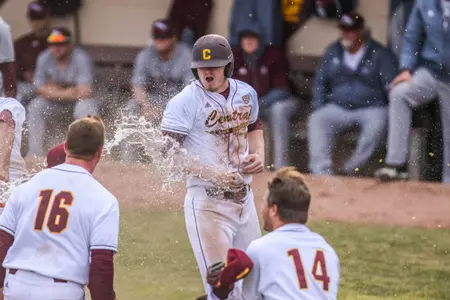 Chippewa players celebrate with Colton Bradley (7) after Bradley scored the winning run on Friday in Game 2 of a doubleheader with Missouri State at Theunissen Stadium.