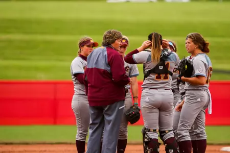 Coach Margo Jonker gathers team members for a meeting in a circle Friday during the Chippewas' 3-0 season-ending loss to Northern Illinois in the Mid-American Conference Tournament.