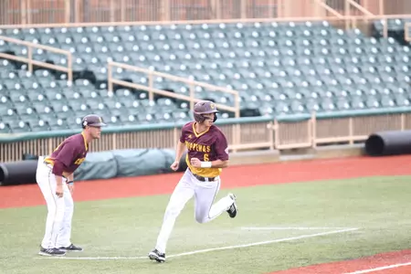 CMU's Alex Borglin (right) rounds third and heads for home in the Chippewas' 16-5 victory over Western Michigan on Thursday at Sprenger Stadium in Avon, Ohio.