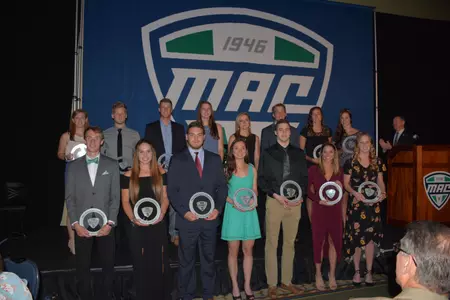 Central Michigan's Christen Chiesa and Dylan Banagis stand among the 24 recipients of the Medal of Excellence Award at the Mid-American Conference Honors Dinner in Cleveland on Wednesday.