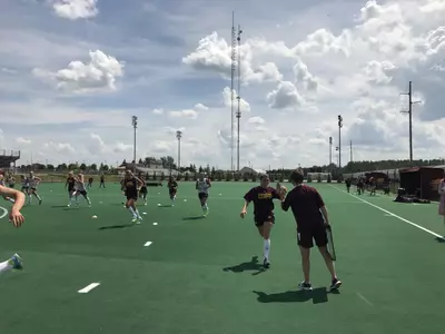 Third-year coach Molly Pelowski (right) puts her CMU field hockey team through its paces on Wednesday during their first practice of the 2017 season.