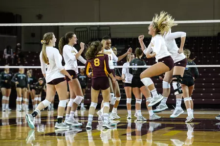 CMU players celebrate a point Friday in their five-set come-from-behind victory over Indiana State at McGuirk Arena.