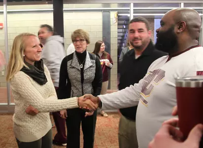 New CMU field hockey coach Catherine Ostoich (left) is introduced to fellow Chippewa coaches, administrators and staff on Friday morning in the Media Room at the John G. Kulhavi Events Center.