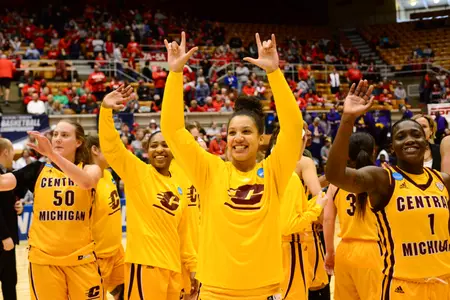 CMU senior Aleah Swary and teammates salute fans after the 11th-seeded Chippewas upset sixth-seeded LSU on Saturday in a first-round NCAA Tournament game.