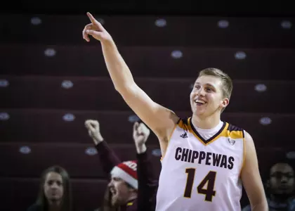 CMU's David DiLeo salutes the crowd after the Chippewas' thrilling 81-77 win over Bowling Green in a MAC Tournament opener at McGuirk Arena on Monday.