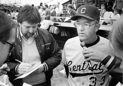 Dean Kreiner (right) is interviewed after a 1986 game.