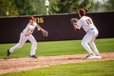 CMU shortstop Jordan Patty (left) tosses to second baseman Jason Sullivan for a force out at second on Tuesday in the Chippewas' 13-2 victory over Michigan State at Keilitz Field at Theunissen Stadium.