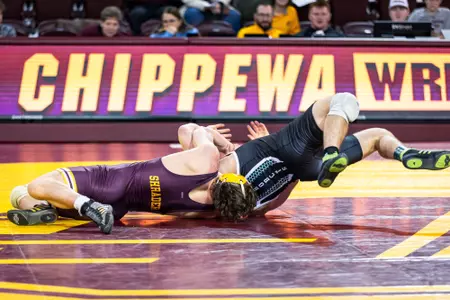 Shrader's Dramatic Comeback Win Highlights CMU's Dual Victory Over Ohio Image