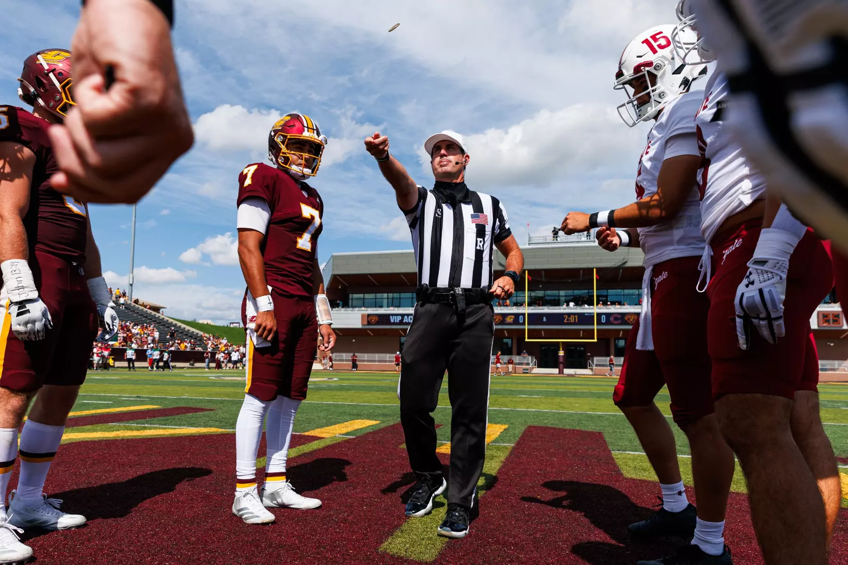 Angel Flores (#7) watches as the head official flips the coin during the coin toss Central Michigan vs Colgate football game on Saturday Sept. 121, 2026 in Mount Pleasant. (Ty Klopf/Central Michigan Football)