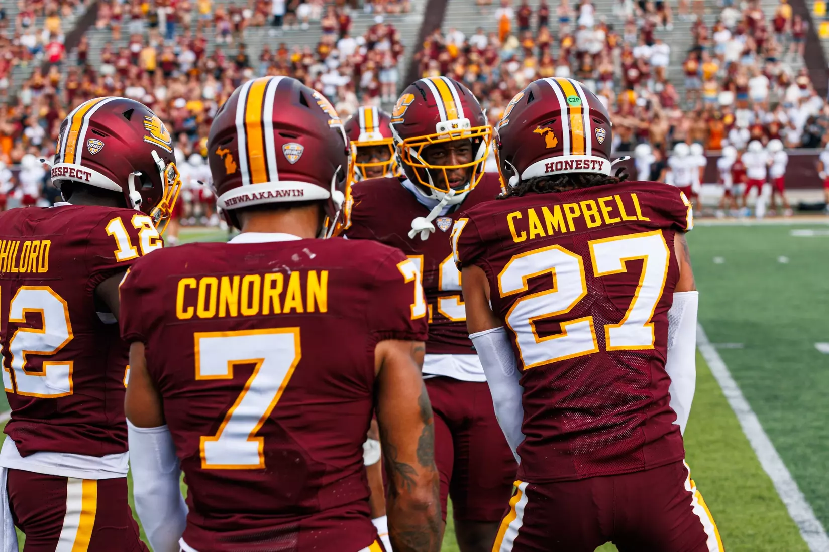 Darrell Bryant Jr. (#19) celebrates with his teammates after a interception during the Central Michigan vs Colgate football game on Saturday Sept. 12, 2026 in Mount Pleasant. (Ty Klopf/Central Michigan Football)