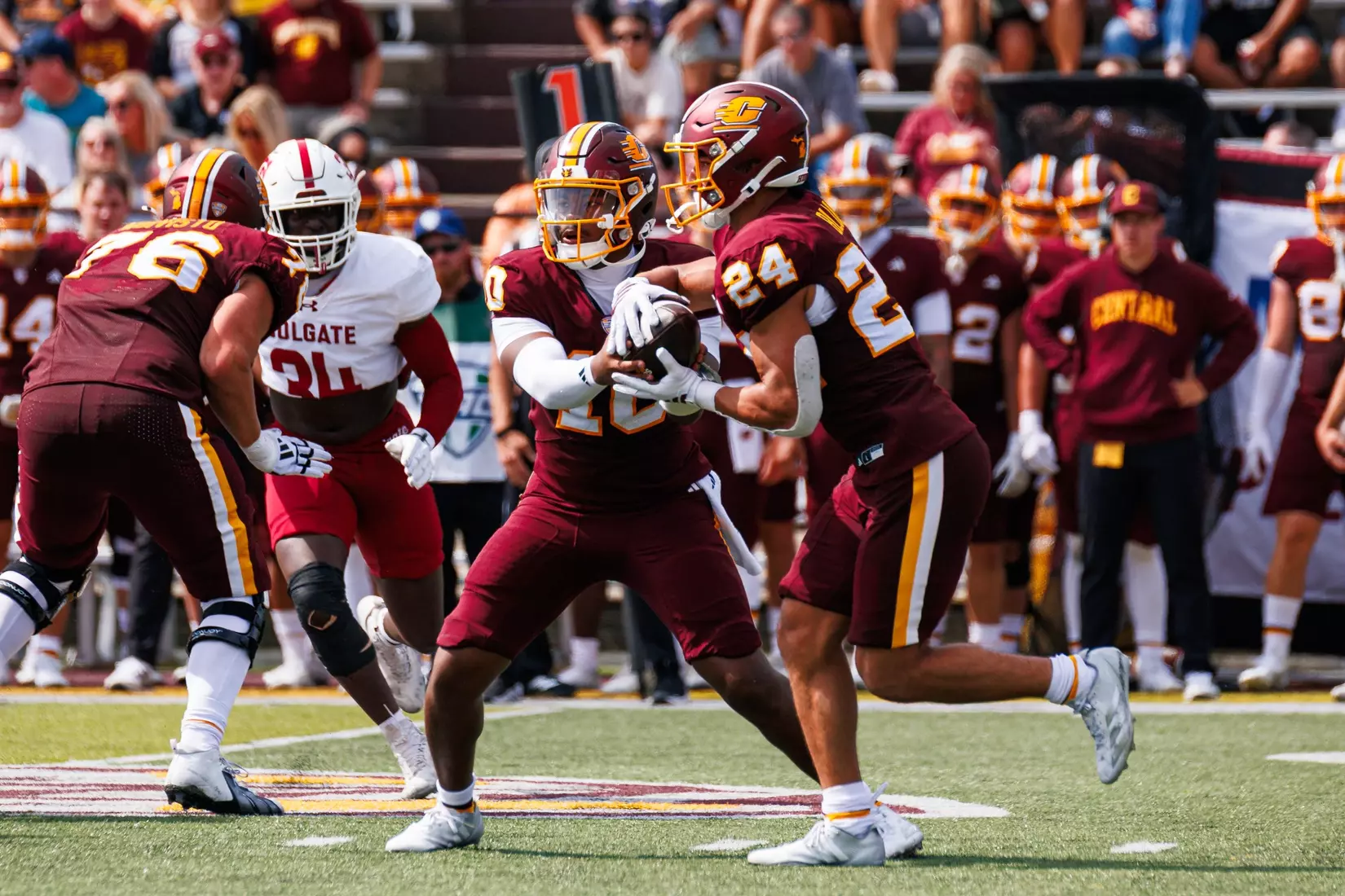 Marcus Beamon (#10) hands off the ball to Vaughn Blue (#24) during the 1st half of the Central Michigan vs Colgate football game on Saturday Sept. 12, 2026 in Mount Pleasant. (Ty Klopf/Central Michigan Football)
