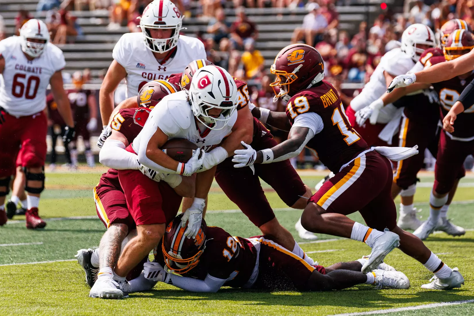 A group of Chippewas tackle a Colgate rusher Central Michigan vs Colgate football game on Saturday Sept. 12, 2026 in Mount Pleasant. (Ty Klopf/Central Michigan Football)