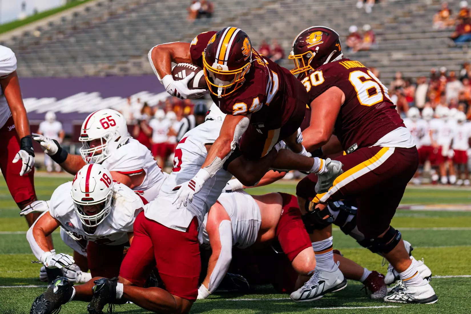 Vaughn Blue (#24) leaps into the endzone for his first touchdown during the Central Michigan vs Colgate football game on Saturday Sept. 12, 2026 in Mount Pleasant. (Ty Klopf/Central Michigan Football)