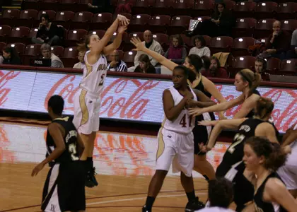 Cougars Take Care of Terriers, 65-52