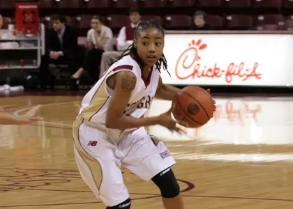 Gerty Lifts Cougars over Liberty, 49-46