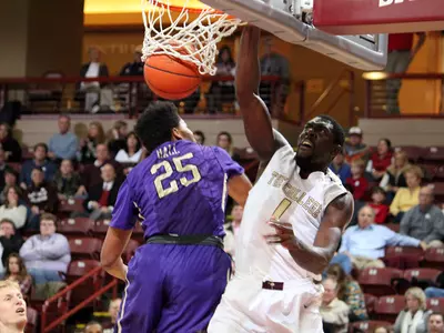 Cougars Suffer Setback To JMU, 61-50