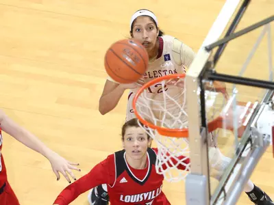 Louisville Escapes As Cougars' Comeback Effort Falls Short