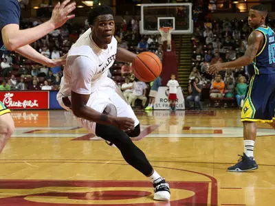 Cougars Fall Short On The Road at Northeastern