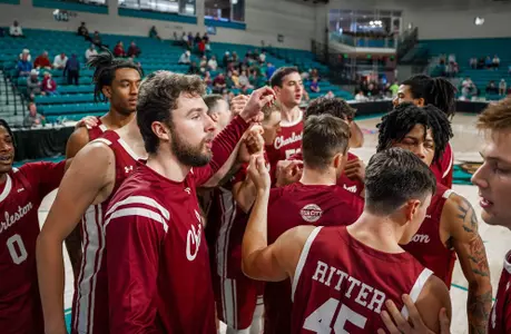 mens basketball huddle
