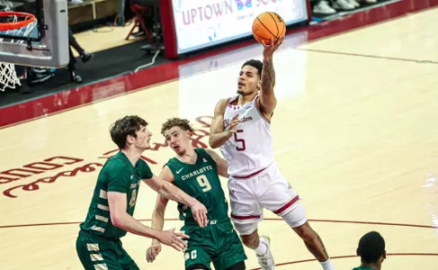 Martin Kalu shoots the basketball