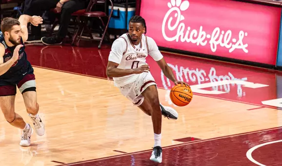 Jaxon Prunty dribbles the ball up the court