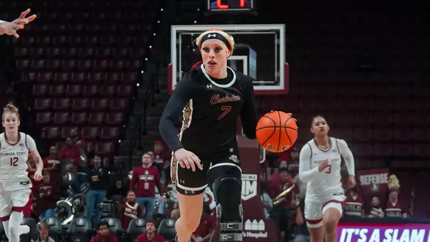 Jami Hill dribbles ball up the court at Florida State