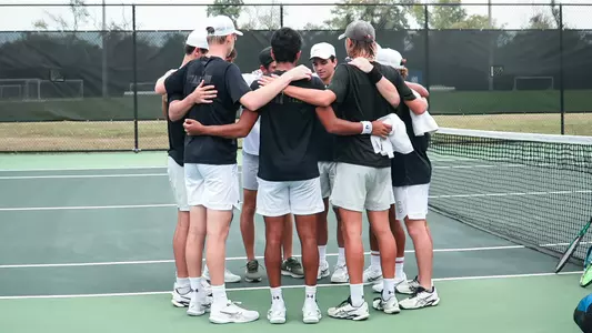 Men's Tennis Team Huddles Prior to Charleston Invitational