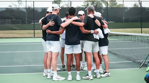 Men's Tennis Team Huddles Prior to Charleston Invitational