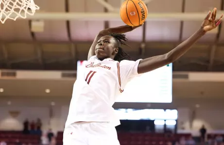 Chol Machot dunks the basketball