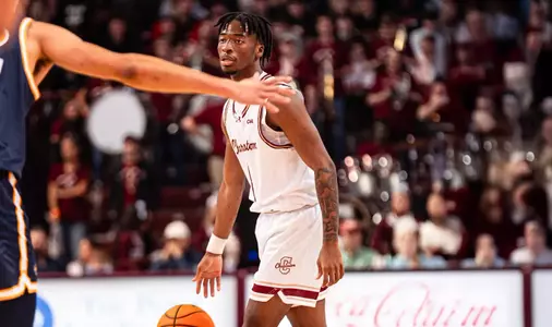Chadlyn traylor dribbles the basketball