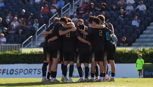 Men's soccer huddle