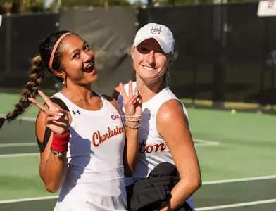 Oziera Ahmad and Riley Trinkle celebrate doubles win