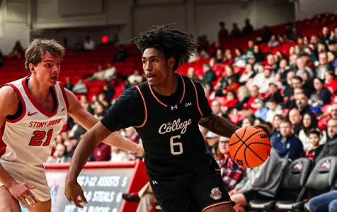 Chris Davis Jr. dribbles the ball
