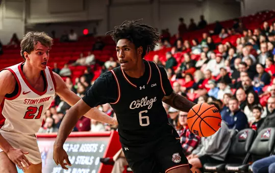 Chris Davis Jr. dribbles the ball