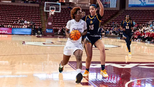 Taylor Barbot drives against NC A&T