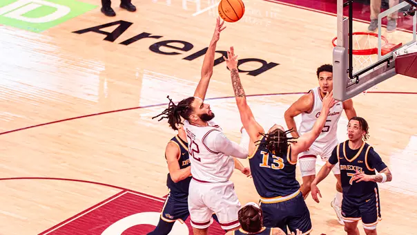 Christian Reeves shoots the basketball