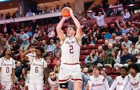 Colby Duggan shoots a three point shot