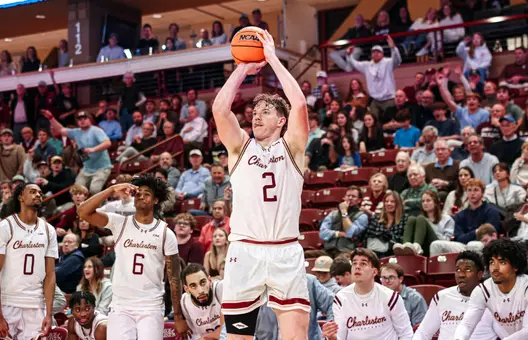 Colby Duggan shoots a three point shot