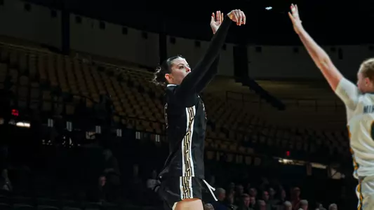 Sophia Tougas shoots three pointer at William & Mary