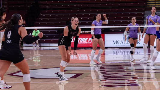 Julia Gnida celebrating a Charleston point.