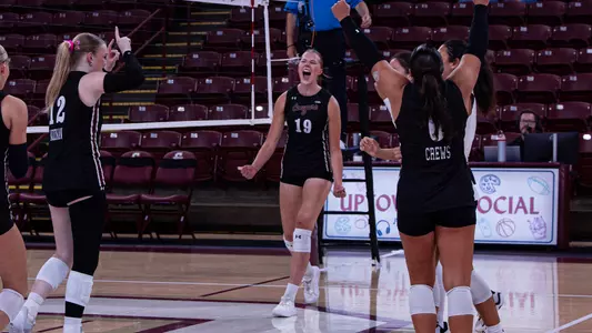 Laura Sarajarvi celebrating a teammate's kill.