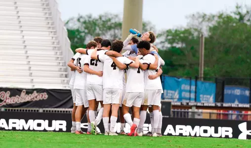Men's soccer huddle