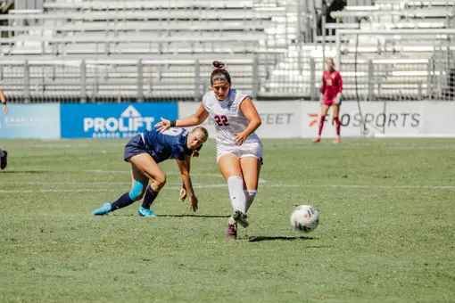 Sienna Petro kicking the ball