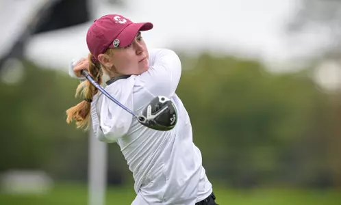carys Fennessy swings the golf club