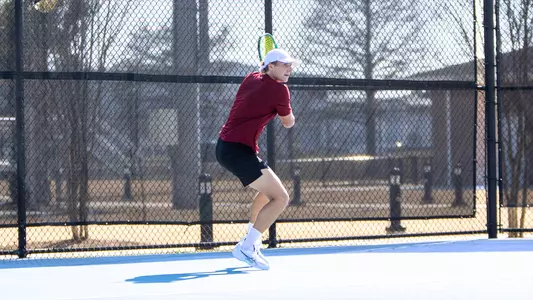 Leon Harder returns serve