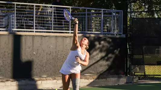 Marra Bruce hits serve