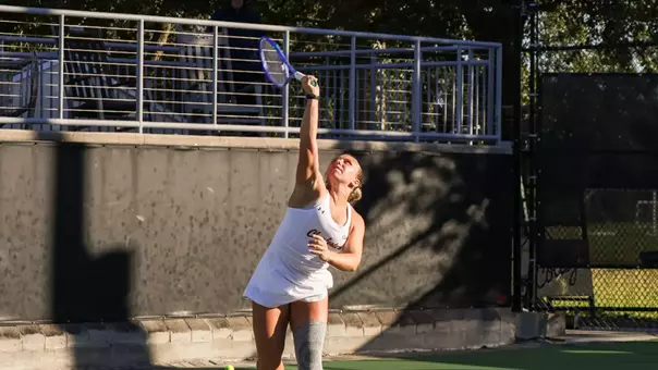 Marra Bruce hits serve